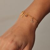 COLGANTE CIRCÓN LILA BAÑADO EN ORO