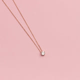 COLLAR PUNTO DE LUZ BAÑADO EN ORO ROSADO