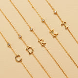 PULSERA INICIAL BAÑADA EN ORO